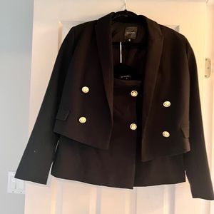 Women’s black skirt suit with blazer